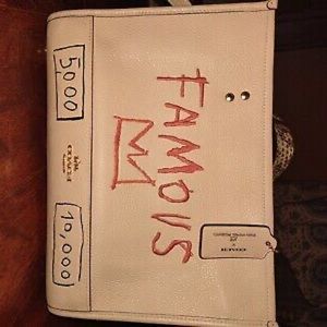 Jean Michel Basquiat coach purse, cream peach color.